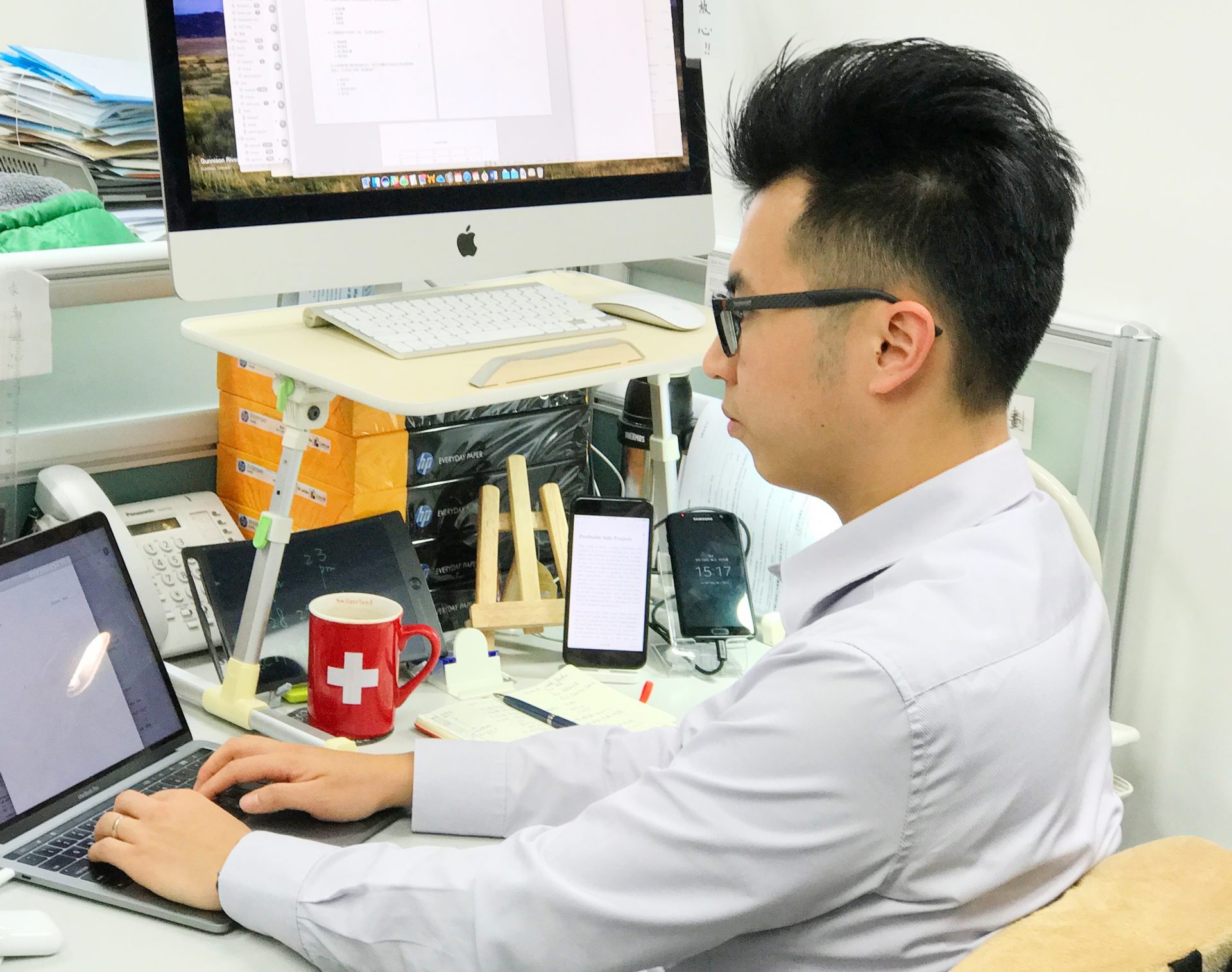 Makzan working at office